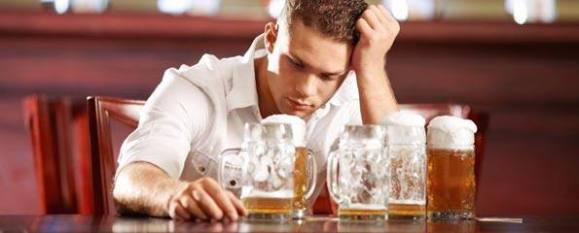 young-man-beer-glasses-595x240